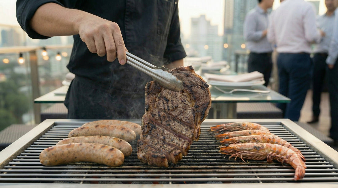 Grilled sausages, premium Australian ribeye steak, and tiger prawns on a BBQ grill at a corporate rooftop BBQ event.